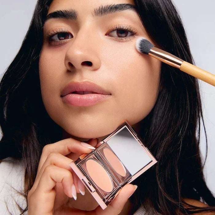 Neutralize dark under-eyes with this waterproof, full-coverage CC corrector. Multi-tasking nutrient-rich formula moisturizes, evens skin tone and smooths fine lines. Free brush (while supplies last). undereye color corrector, dark circle corrector, peach corrector, orange corrector, color corrector dark circles, full coverage undereye, waterproof under eye corrector, neutralize under eye discoloration