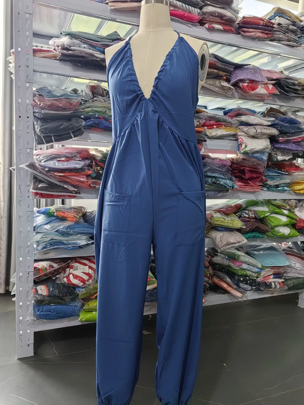 Sexy Deep V-neck Pleated Women Jumpsuit 2025 New Spring Summer Fashion Solid Color Pocket Halter Neck Backless Foot Binding Suit